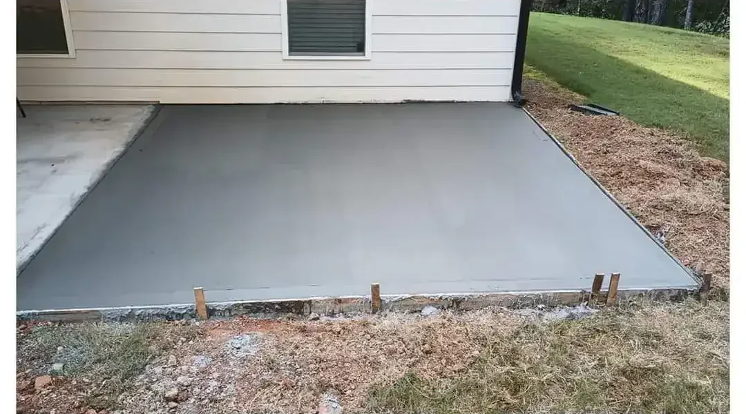 Top-rated concrete contractor completing a stamped concrete patio in Atlanta GA