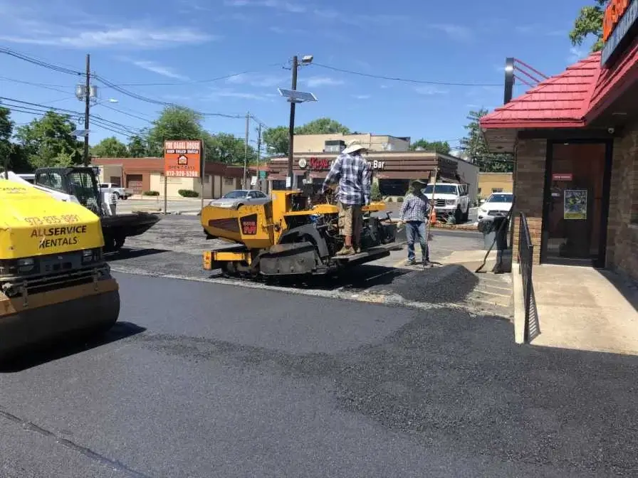 Stamped concrete cost for an outdoor patio with pavers at a commercial property in Atlanta, GA